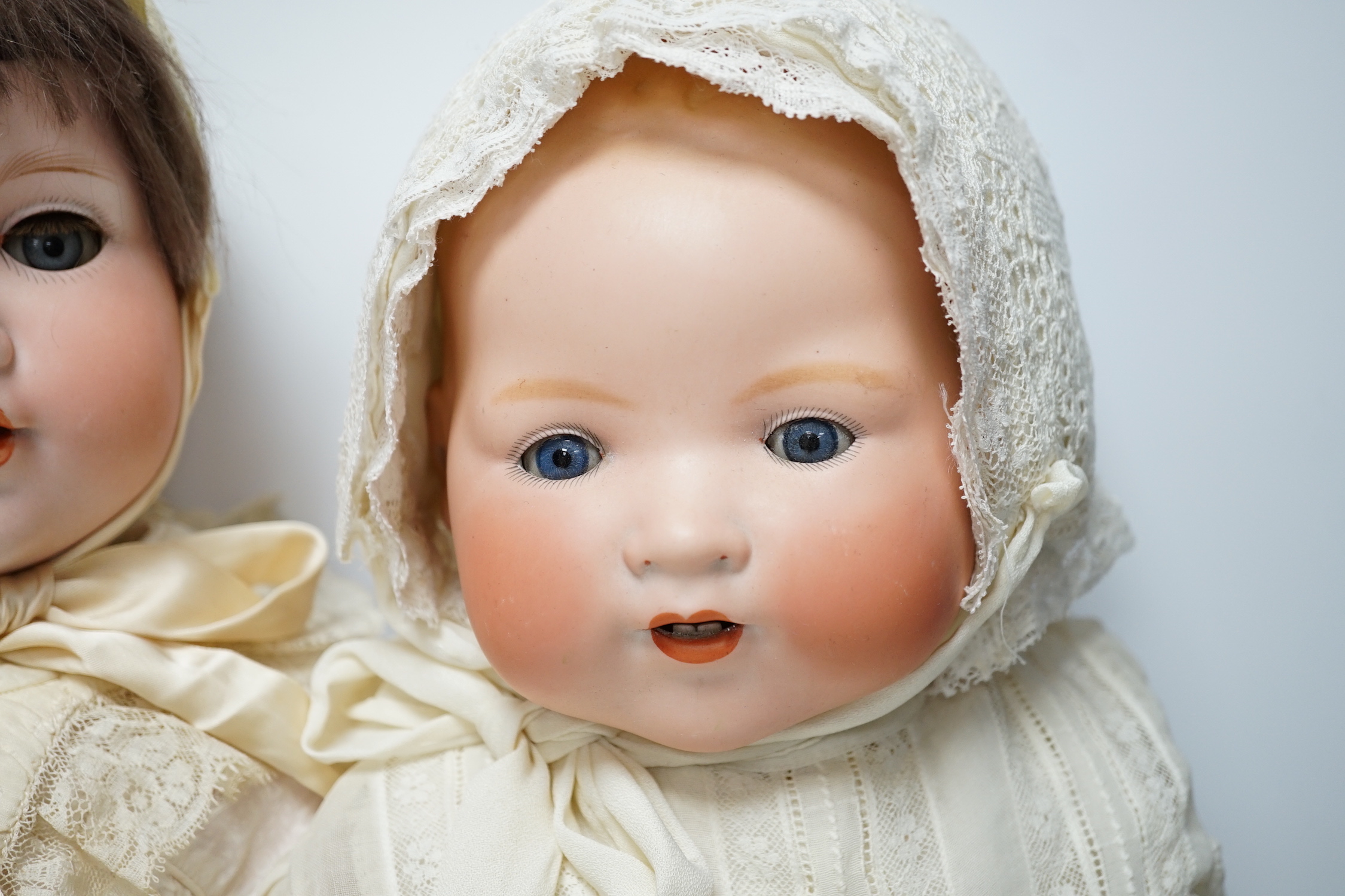 A Dream Baby AM351, 58cm, good condition and a Melitta Baby bisque head doll, 60cm, good condition